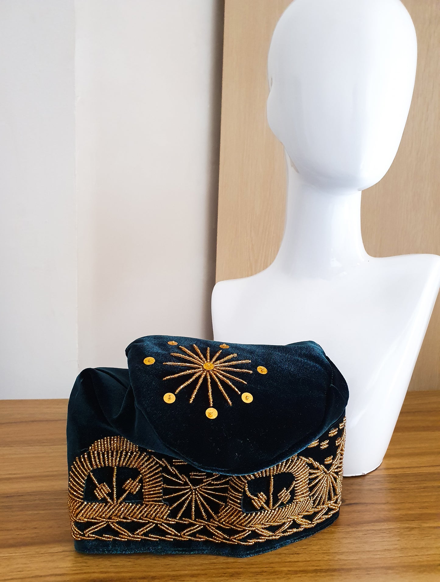 Green and gold beaded hat