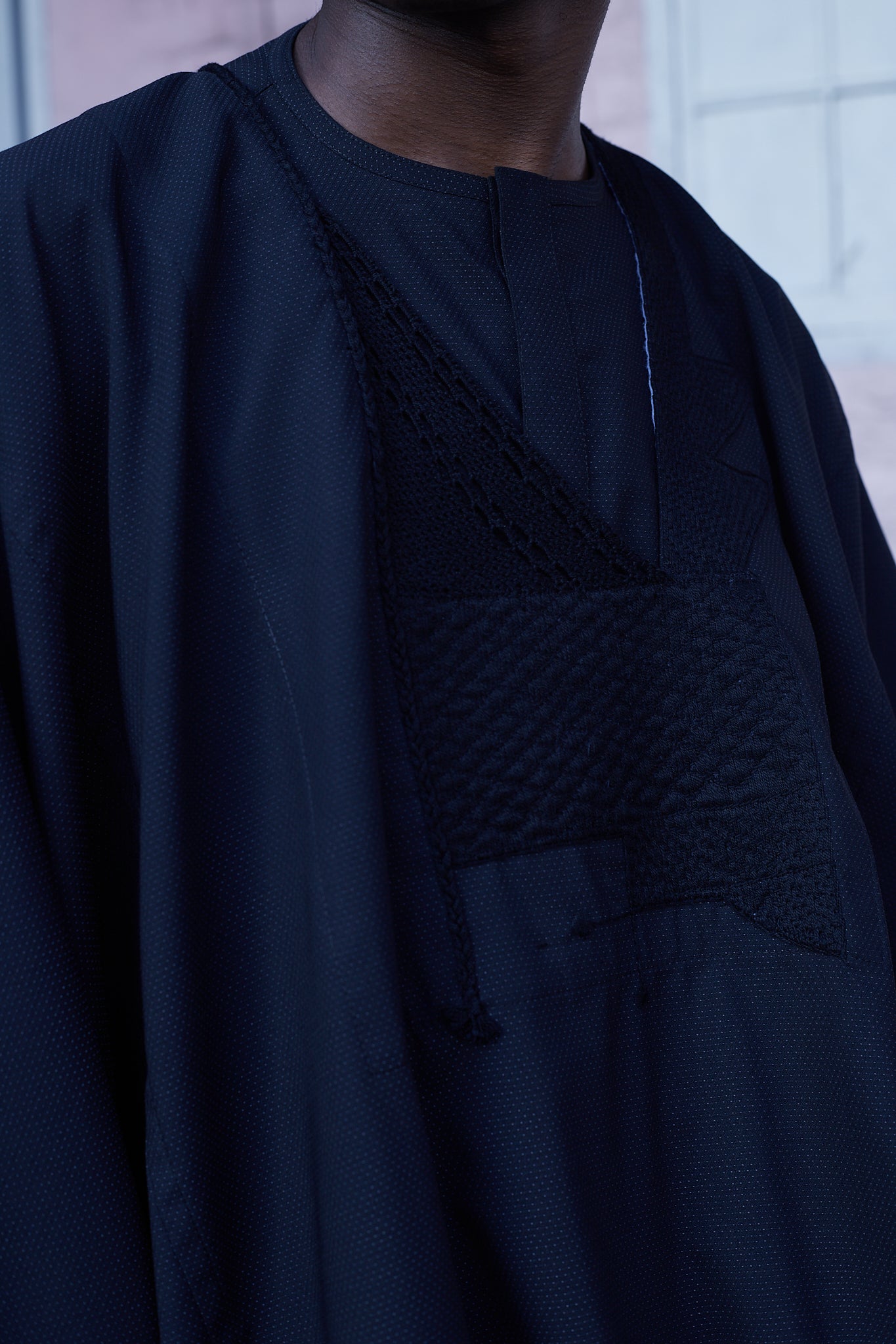 Handknit embroidery details on black Agbada
