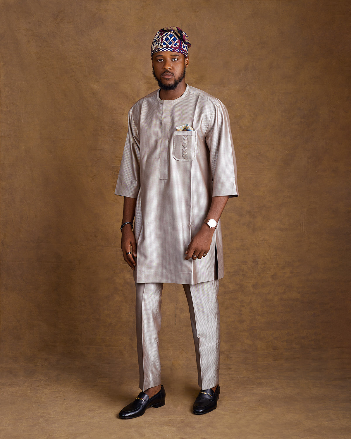 Man in Yoruba mens kaftan with yoruba cap left or right 