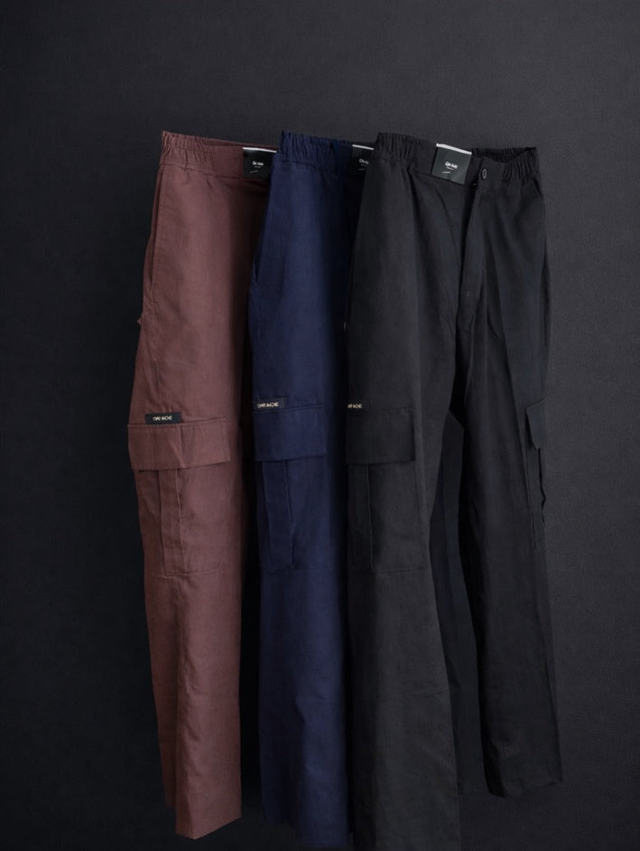 Odé cargo pants in coffee brown, navy blue and black by Orí Adé Originals
