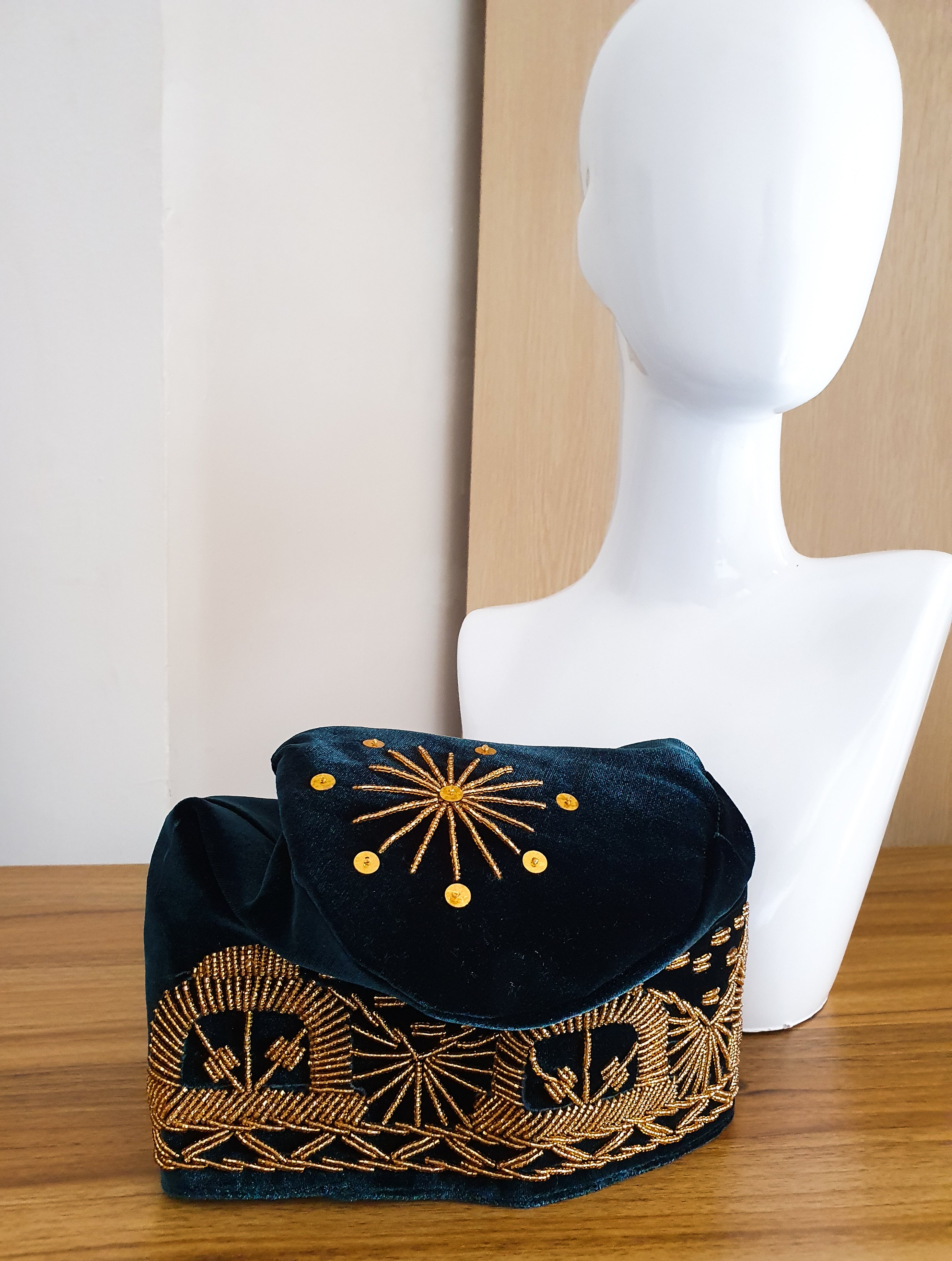 Green and gold beaded hat